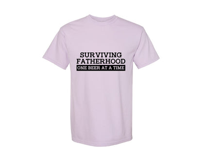 brand:Comfort Colors|color:Orchid|Surviving Fatherhood Mens T Shirt Graphic T-Shirt