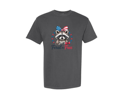 brand:Comfort Colors|color:Pepper|Feral But Free Raccoon Patriotic Graphic T-Shirt