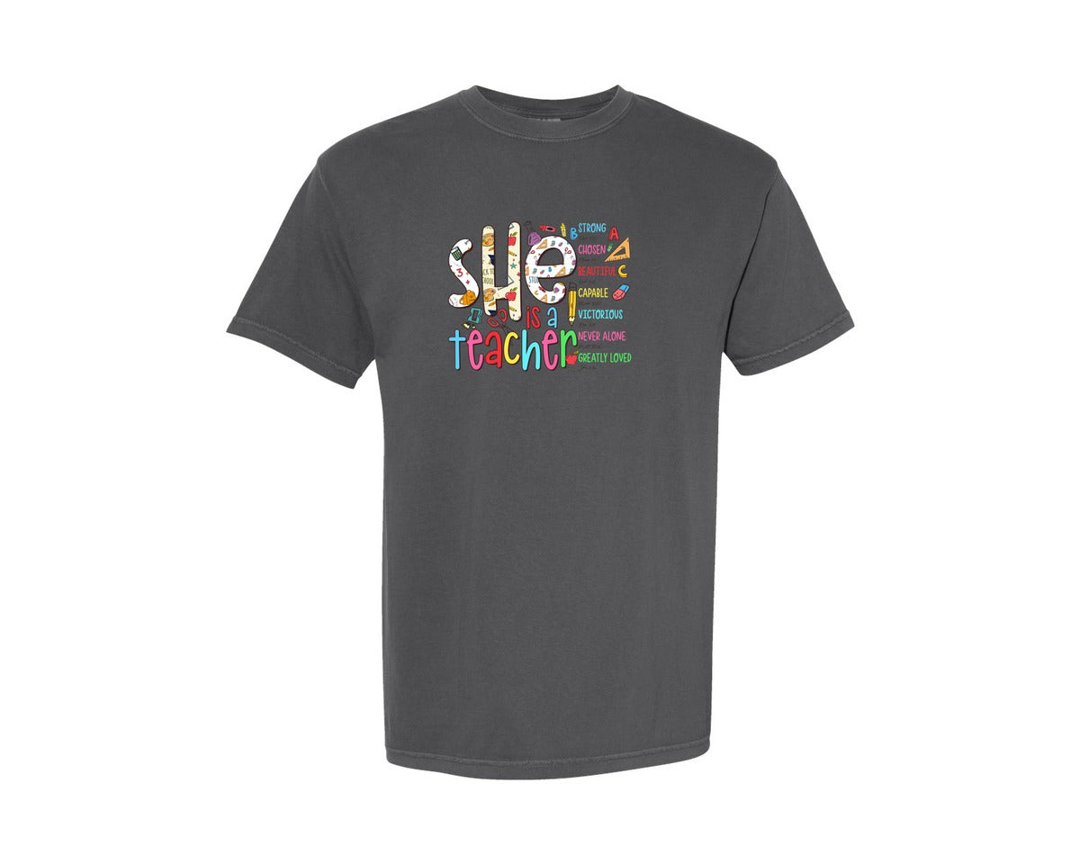brand:Comfort Colors|color:Pepper|She Is Teacher Bible Verse Teacher Graphic T-Shirt