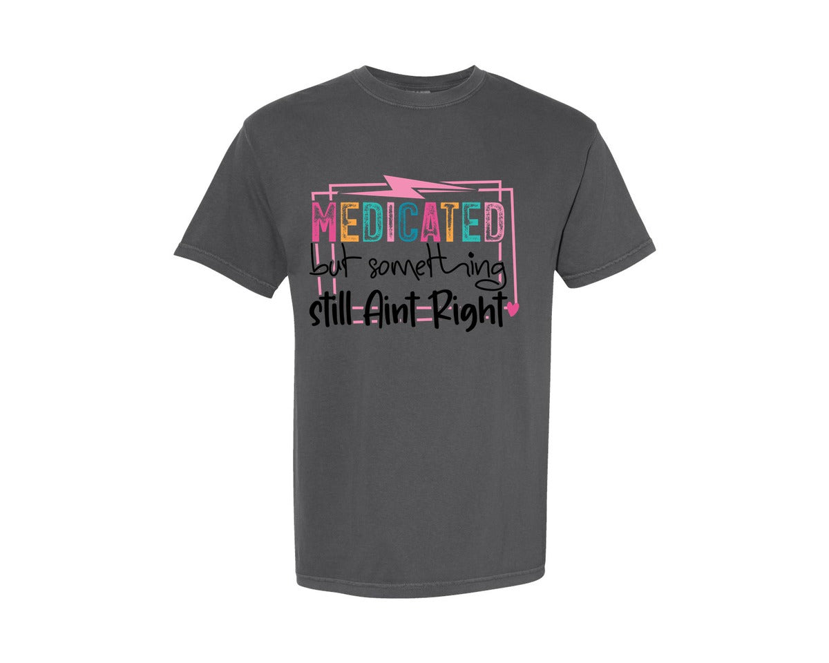 brand:Comfort Colors|color:Pepper|Medicated But Somethin Aint Right Snarky Graphic T-Shirt