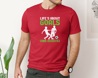 brand:Bella Canvas|color:Red|Lifes About Goals Soccer T Shirt Graphic T-Shirt