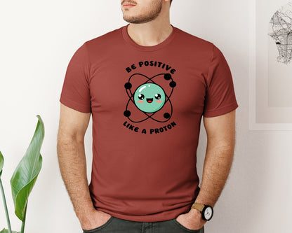 brand:Bella Canvas|color:Rust|Be Positive Like A Proton Graphic T-Shirt