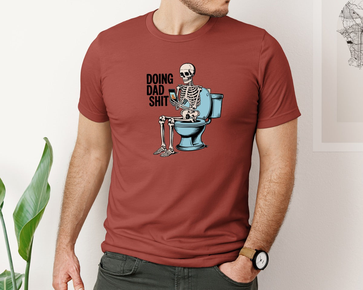 brand:Bella Canvas|color:Rust|Doing Dad Sht Skeleton On Toilet 3 Graphic T-Shirt