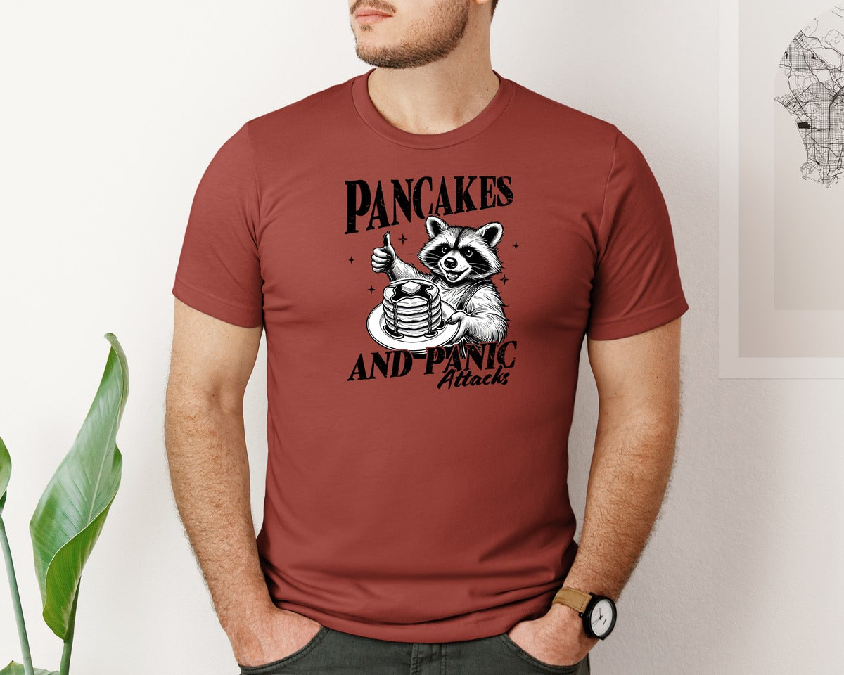 brand:Bella Canvas|color:Rust|Mental Health Raccoon Pancakes And Panic Graphic T-Shirt