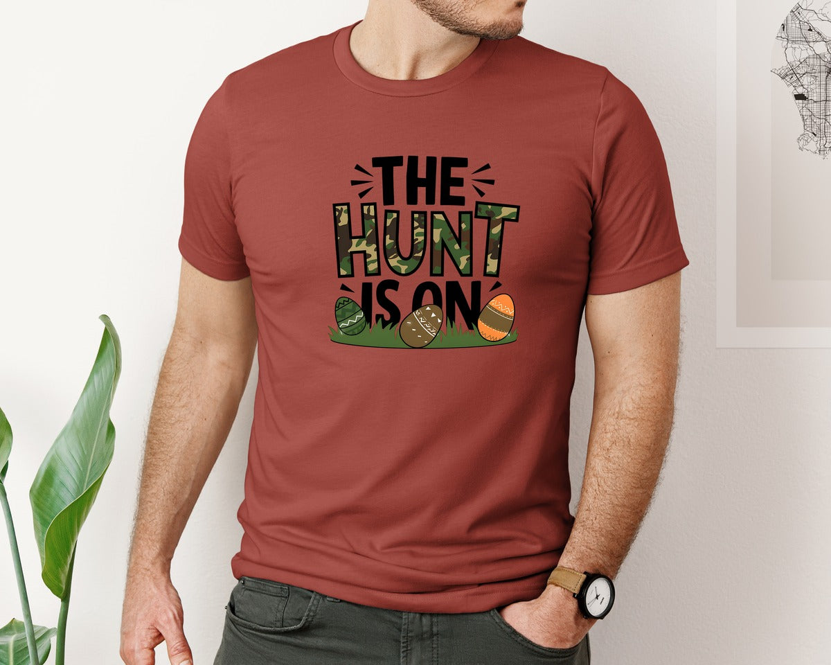 brand:Bella Canvas|color:Rust|The Hunt Is On Camo Easter Egg Camo Graphic T-Shirt