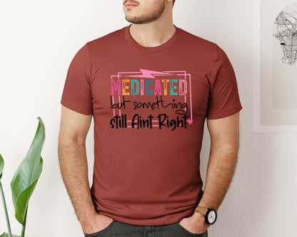 brand:Bella Canvas|color:Rust|Medicated But Somethin Aint Right Snarky Graphic T-Shirt