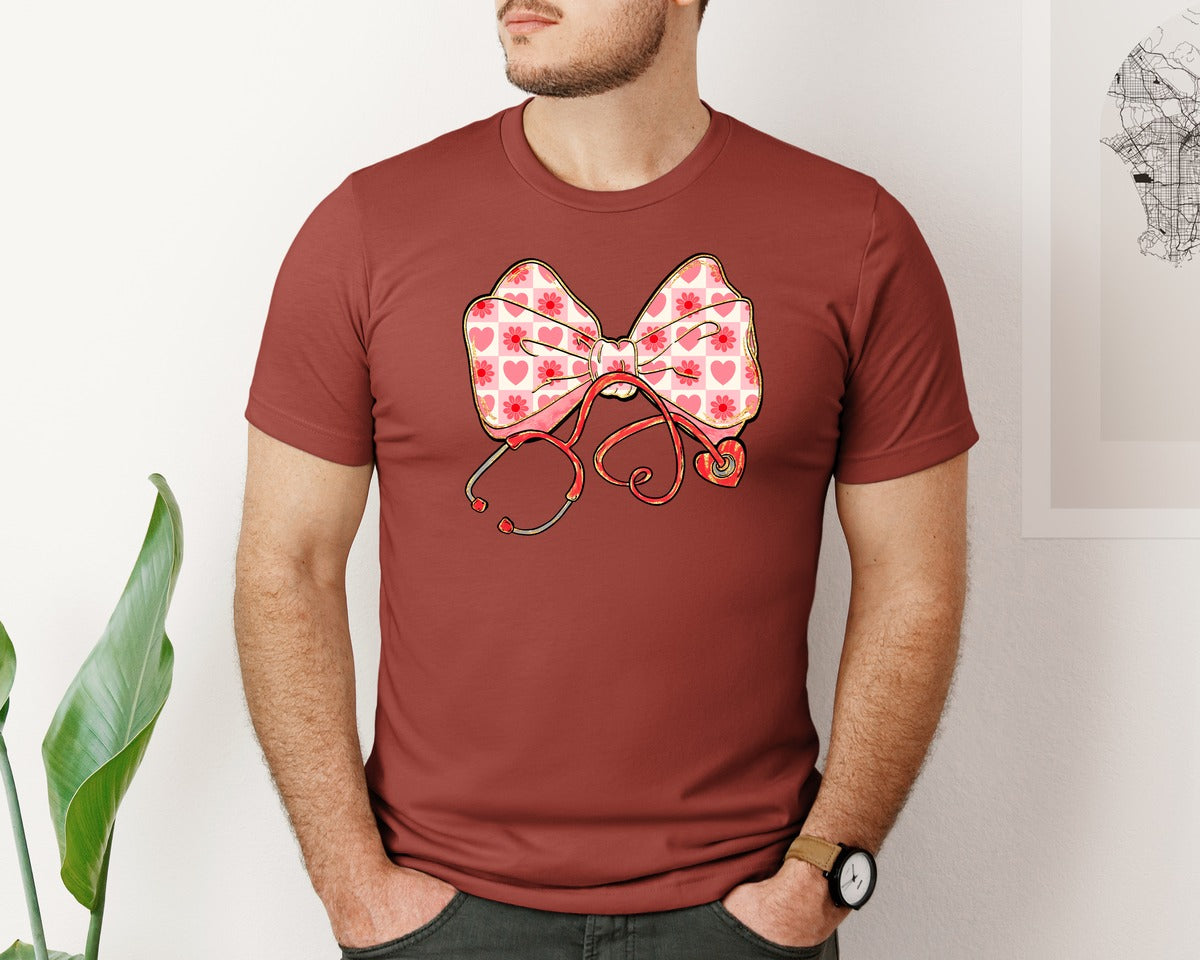 brand:Bella Canvas|color:Rust|Valentine Nurse Stethoscope Bow Heart Graphic T-Shirt