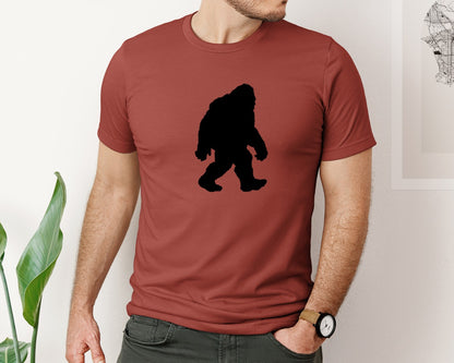 brand:Bella Canvas|color:Rust|Bigfoot Sasquatch Figure Design Graphic T-Shirt