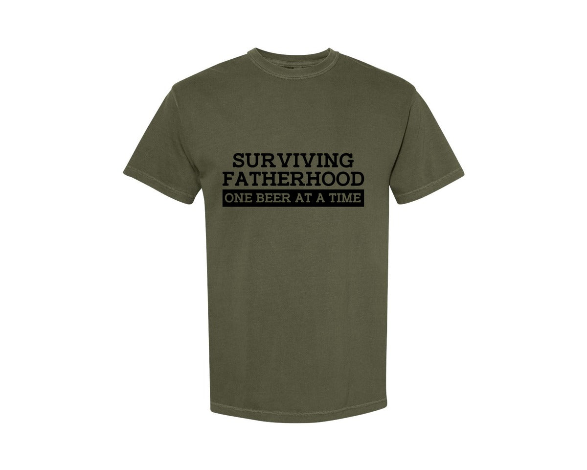 brand:Comfort Colors|color:Sage Green|Surviving Fatherhood Mens T Shirt Graphic T-Shirt