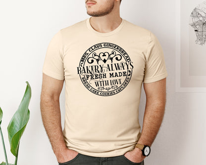 brand:Bella Canvas|color:Soft Cream|Mrs Claus Gingerbread Bakery Always Fre Graphic T-Shirt