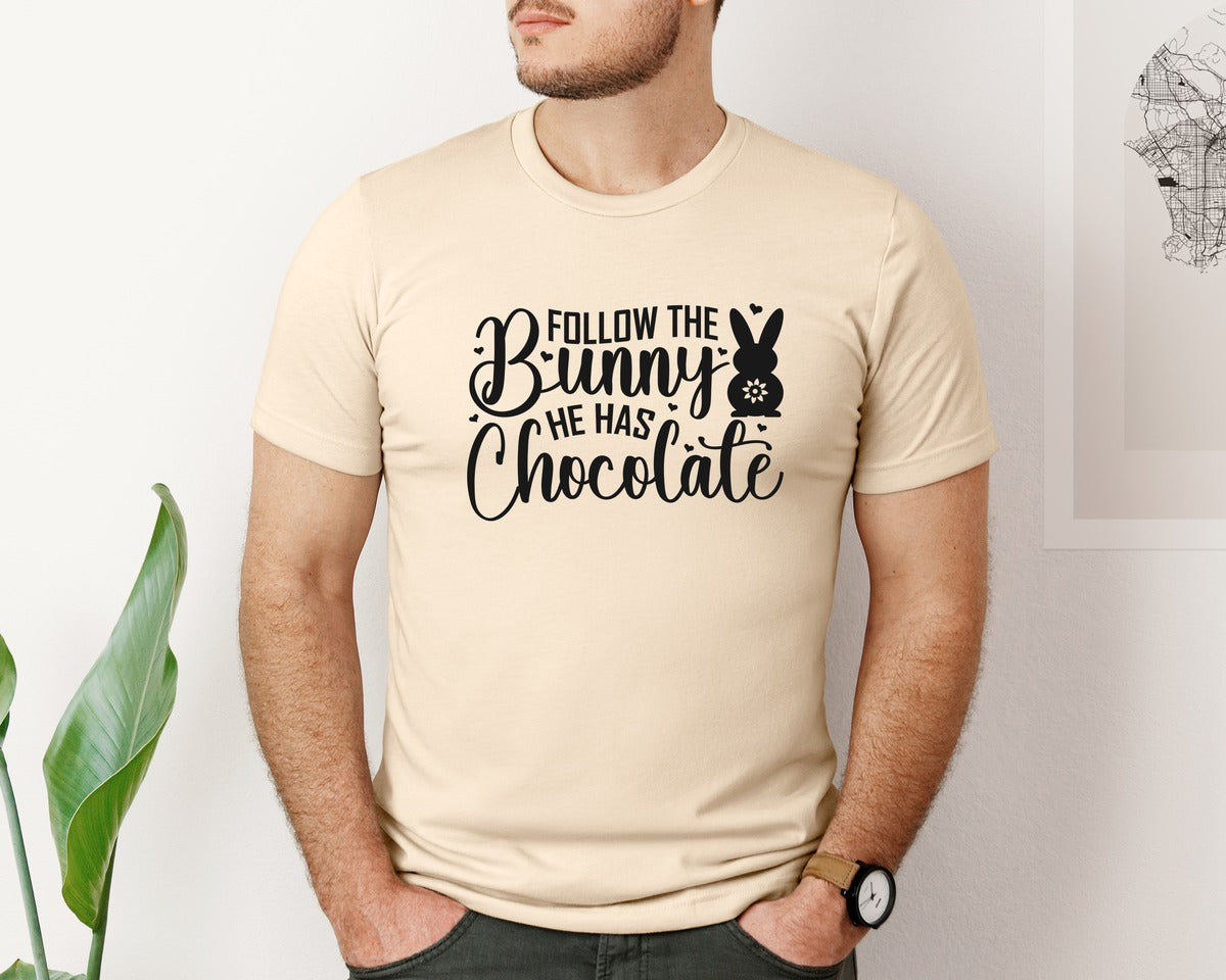 brand:Bella Canvas|color:Soft Cream|Follow The Bunny He Has Chocolate 65 Graphic T-Shirt