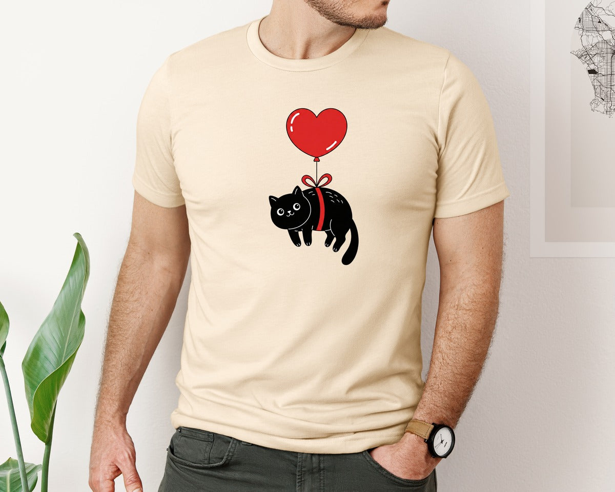 brand:Bella Canvas|color:Soft Cream|Floating Black Cat With Heart Balloon Graphic T-Shirt