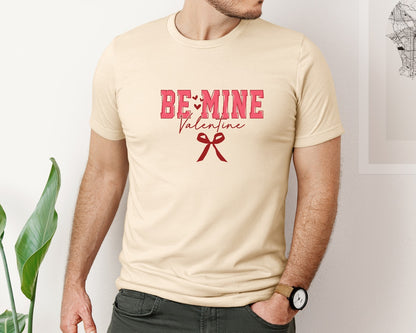 brand:Bella Canvas|color:Soft Cream|Love Be Mine Valentine Coquette Bow Graphic T-Shirt