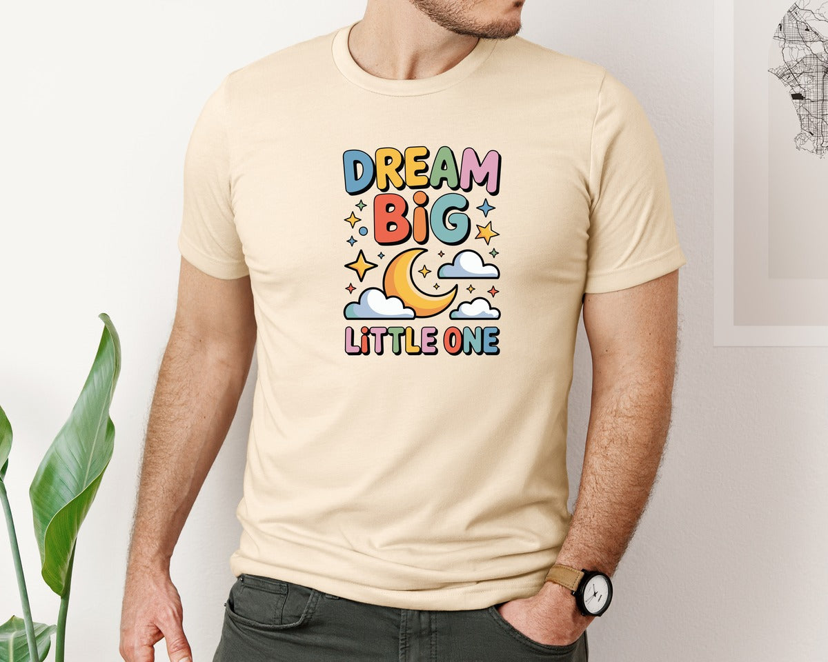 brand:Bella Canvas|color:Soft Cream|Dream Big Little One Space Nursery Art Graphic T-Shirt