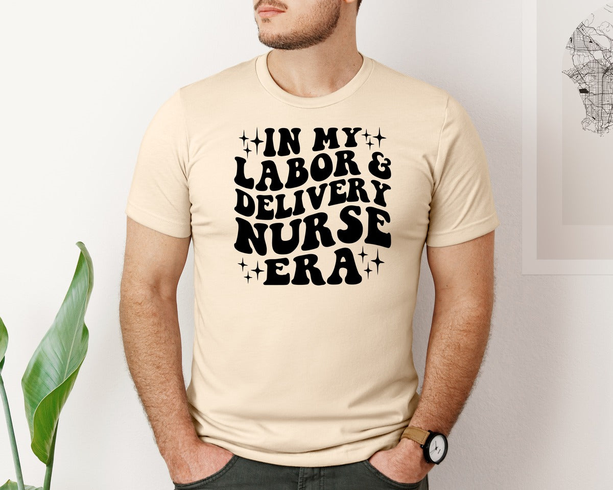 brand:Bella Canvas|color:Soft Cream|In My Labor And Delivery Nurse Era 2 Graphic T-Shirt