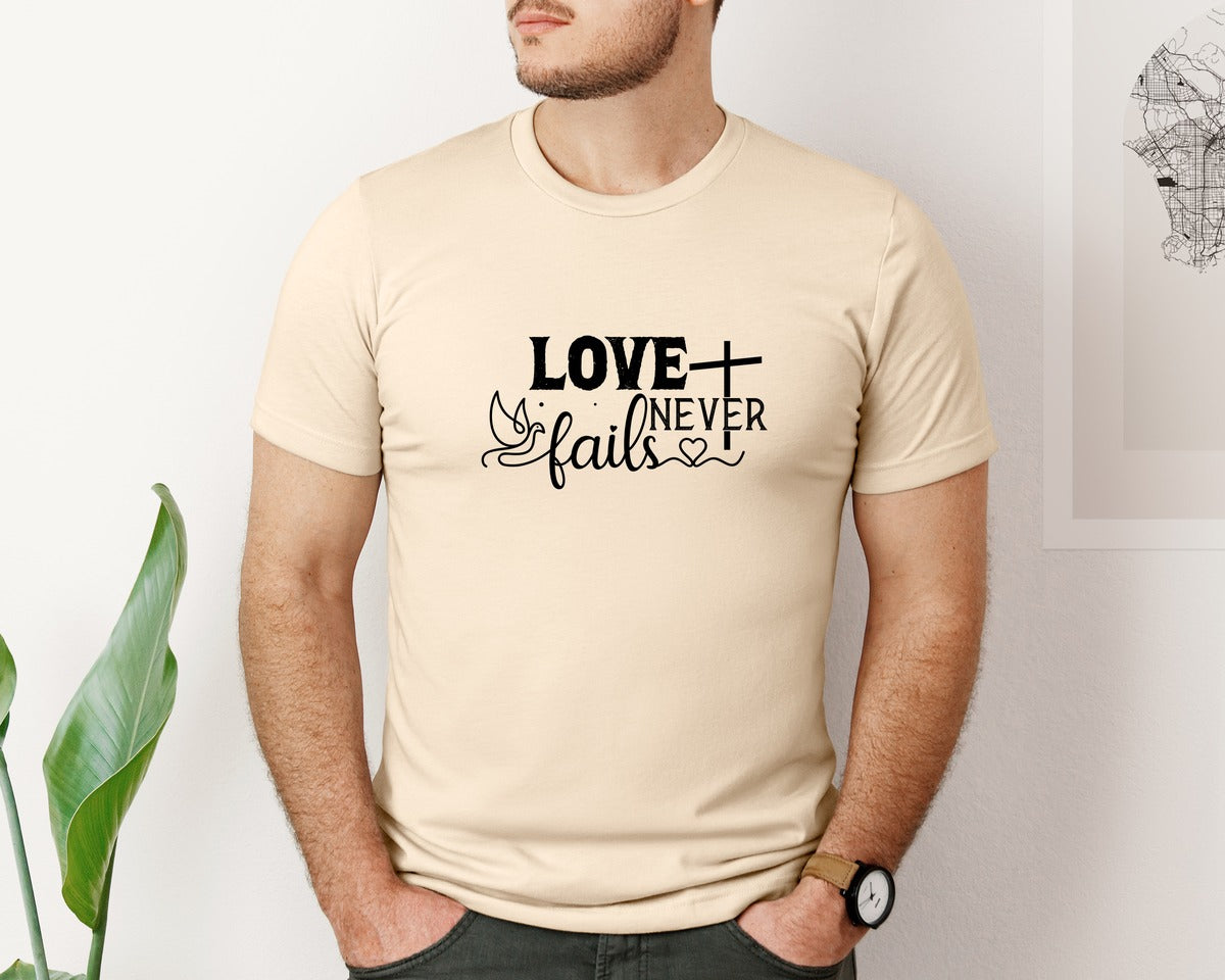 brand:Bella Canvas|color:Soft Cream|Love Never Fails Sleeve Svgbible Quotes Graphic T-Shirt