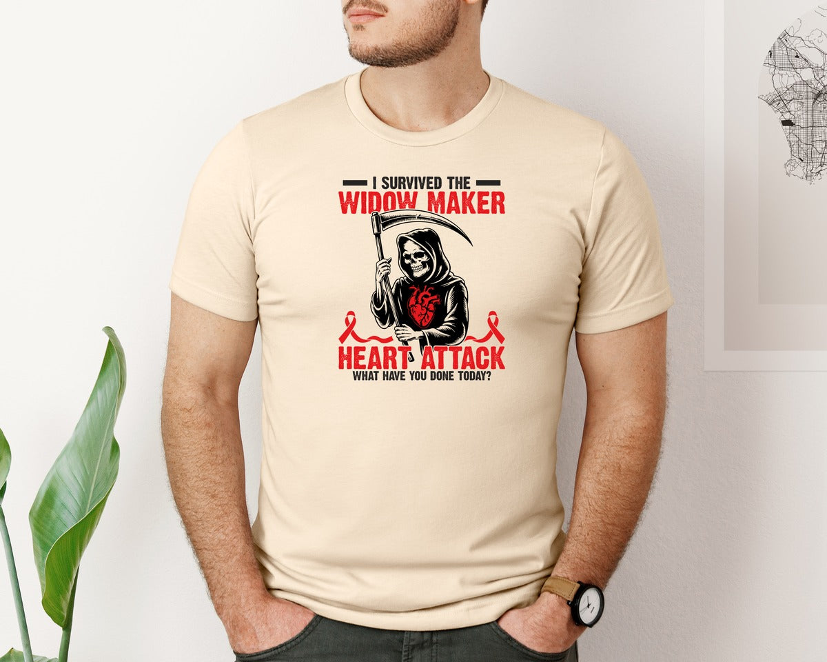 brand:Bella Canvas|color:Soft Cream|I Survived The Widow Maker Heart Attack Graphic T-Shirt