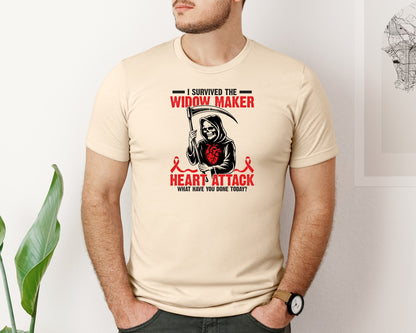 brand:Bella Canvas|color:Soft Cream|I Survived The Widow Maker Heart Attack Graphic T-Shirt
