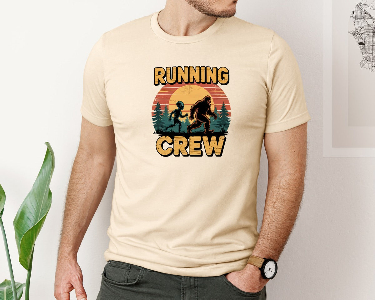 brand:Bella Canvas|color:Soft Cream|Alien Bigfoot Sasquatch Running Man Graphic T-Shirt