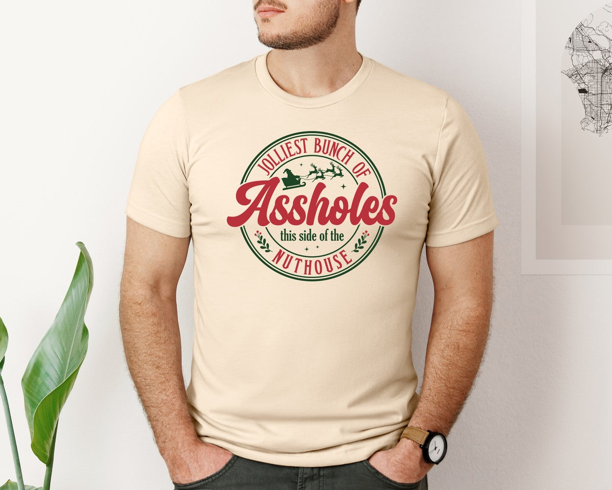 brand:Bella Canvas|color:Soft Cream|Jolliest Bunch Of Assholes Christmas Graphic T-Shirt