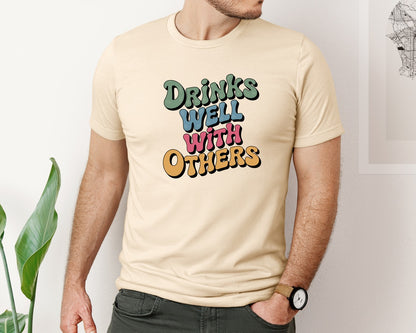 brand:Bella Canvas|color:Soft Cream|Drinks Well With Others Summer Graphic T-Shirt