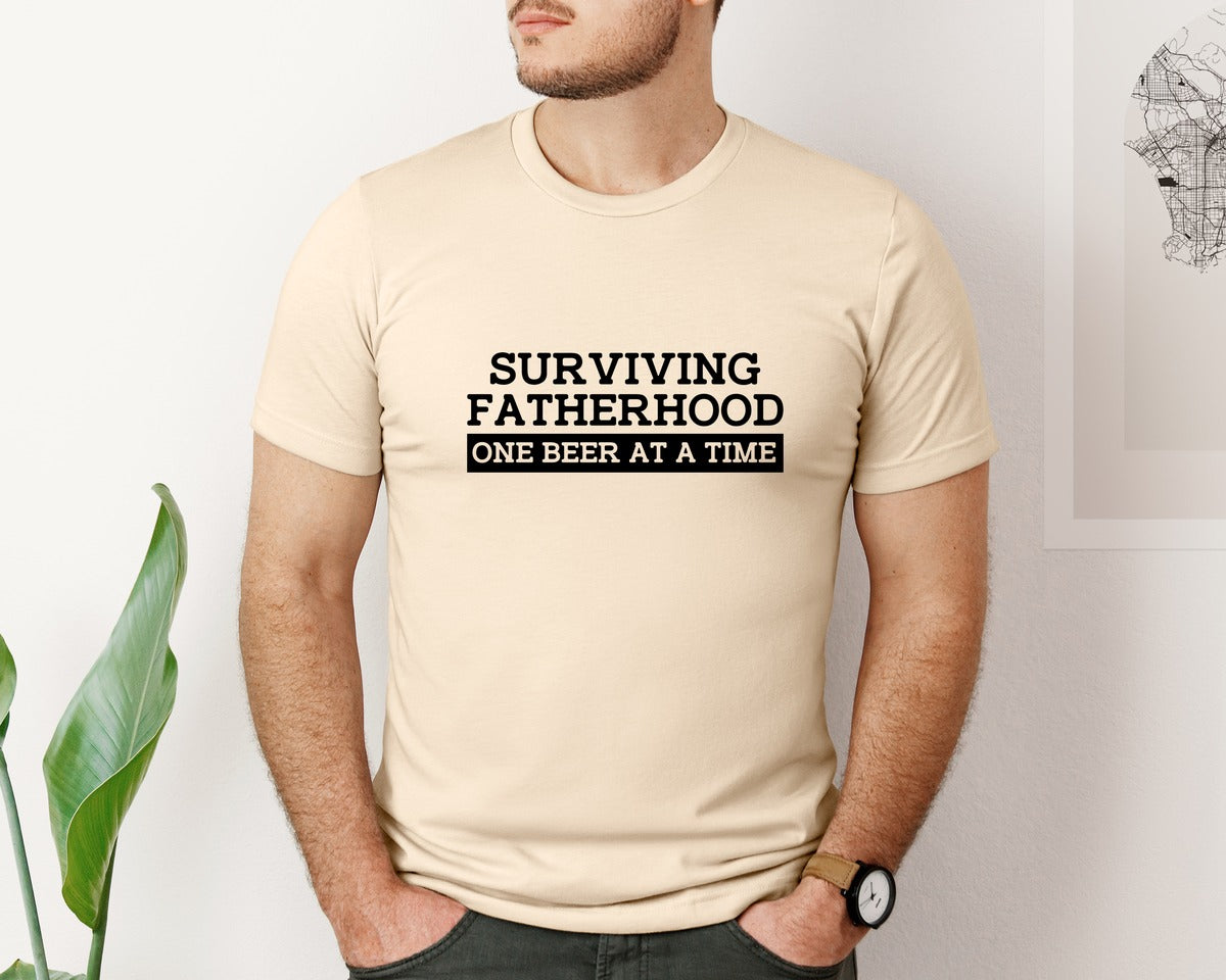 brand:Bella Canvas|color:Soft Cream|Surviving Fatherhood Mens T Shirt Graphic T-Shirt