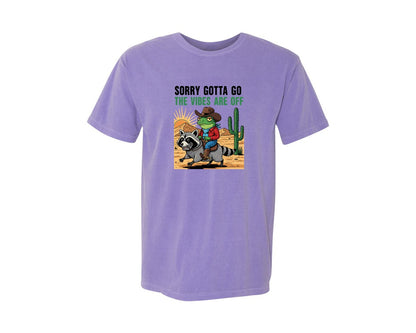 brand:Comfort Colors|color:Violet|Sorry Gotta Go Cowboy Frog Raccoon Graphic T-Shirt
