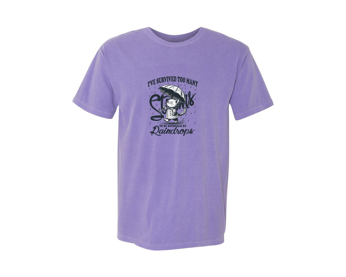 brand:Comfort Colors|color:Violet|Ive Survived Too Many Storms Cat Shirt Graphic T-Shirt