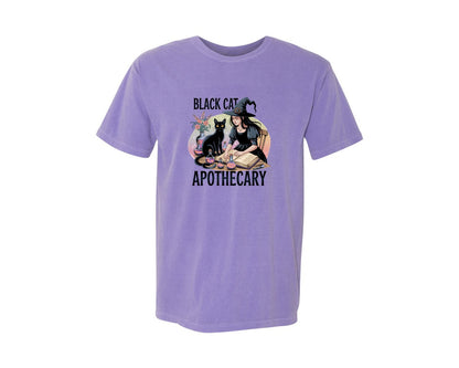 brand:Comfort Colors|color:Violet|Black Cat Apothecary Witchy Book 7 Graphic T-Shirt