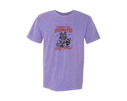 brand:Comfort Colors|color:Violet|Funny Easter Raccoon Stay Feral Graphic T-Shirt