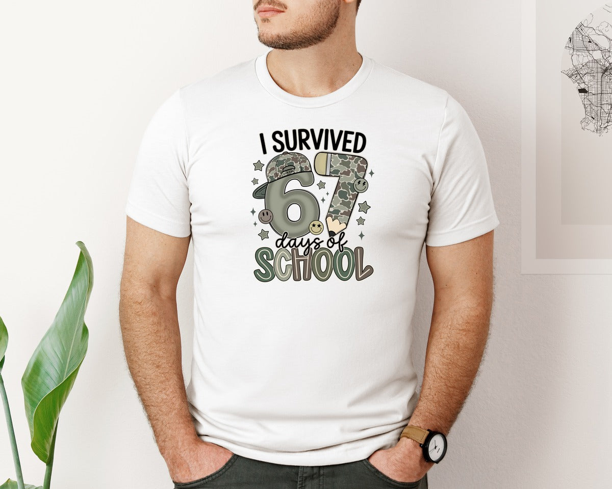 brand:Bella Canvas|color:White|I Survived 67 Days Of School Camo Graphic T-Shirt