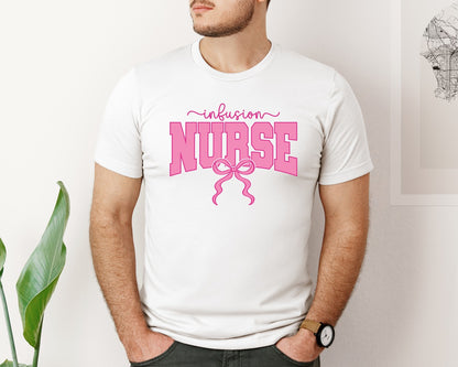 brand:Bella Canvas|color:White|Infusion Nurse Coquette Nursing Pink Bow Graphic T-Shirt