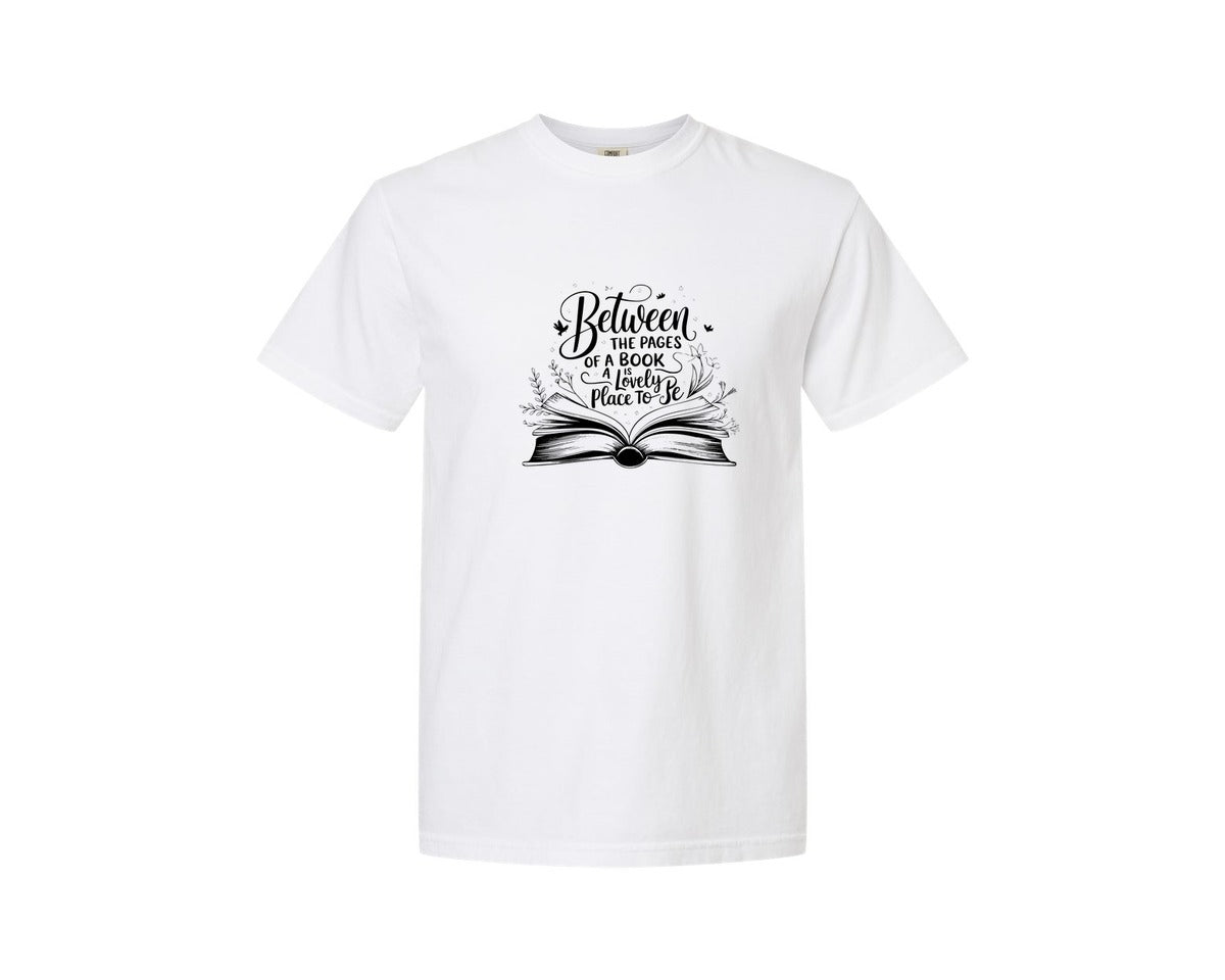 brand:Comfort Colors|color:White|Between The Pages Of A Book Is A Lovely 24 Graphic T-Shirt
