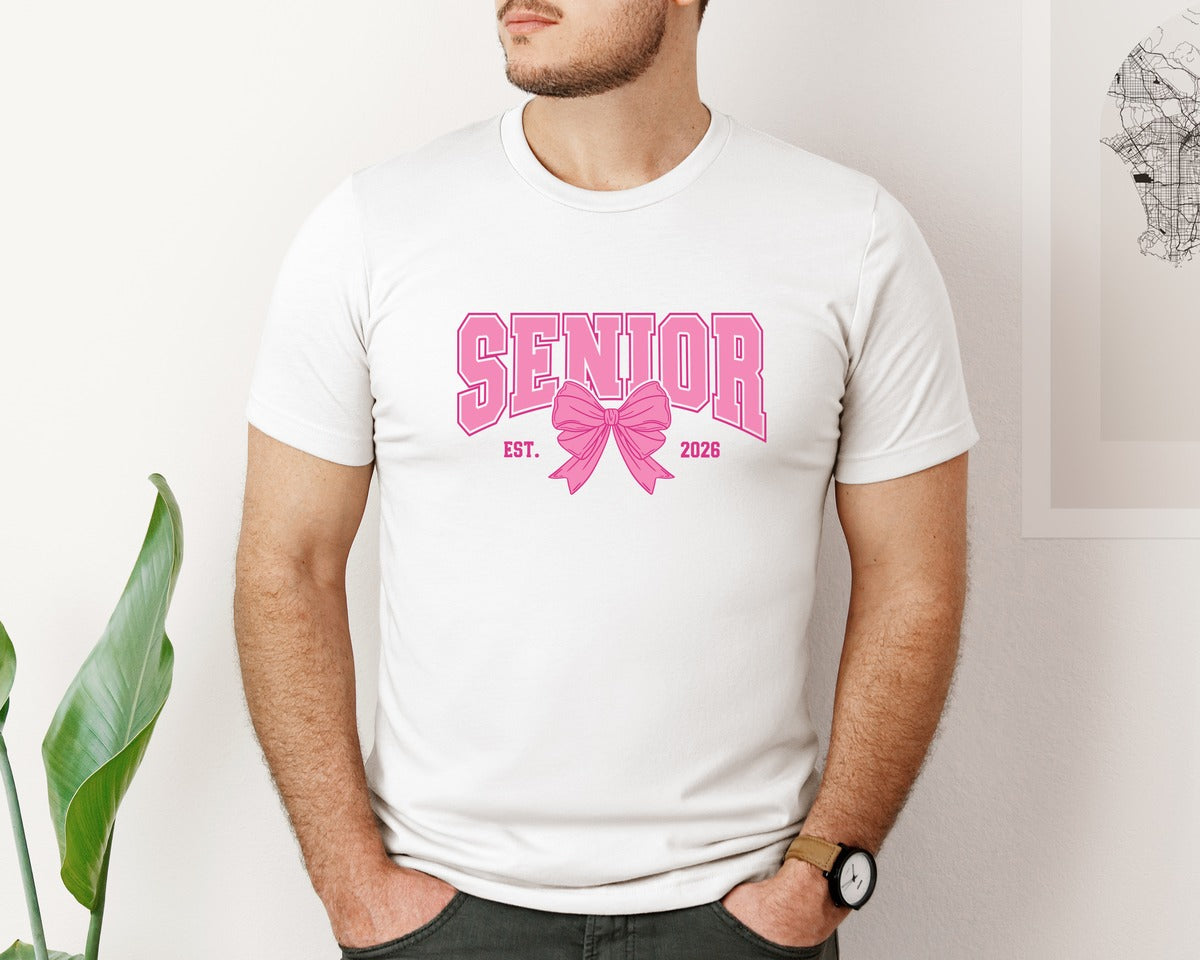 brand:Bella Canvas|color:White|Senior 2026 Coquette Pink Bow 3 Graphic T-Shirt