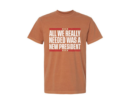 brand:Comfort Colors|color:Yam|All We Really Needed Was A New President Graphic T-Shirt