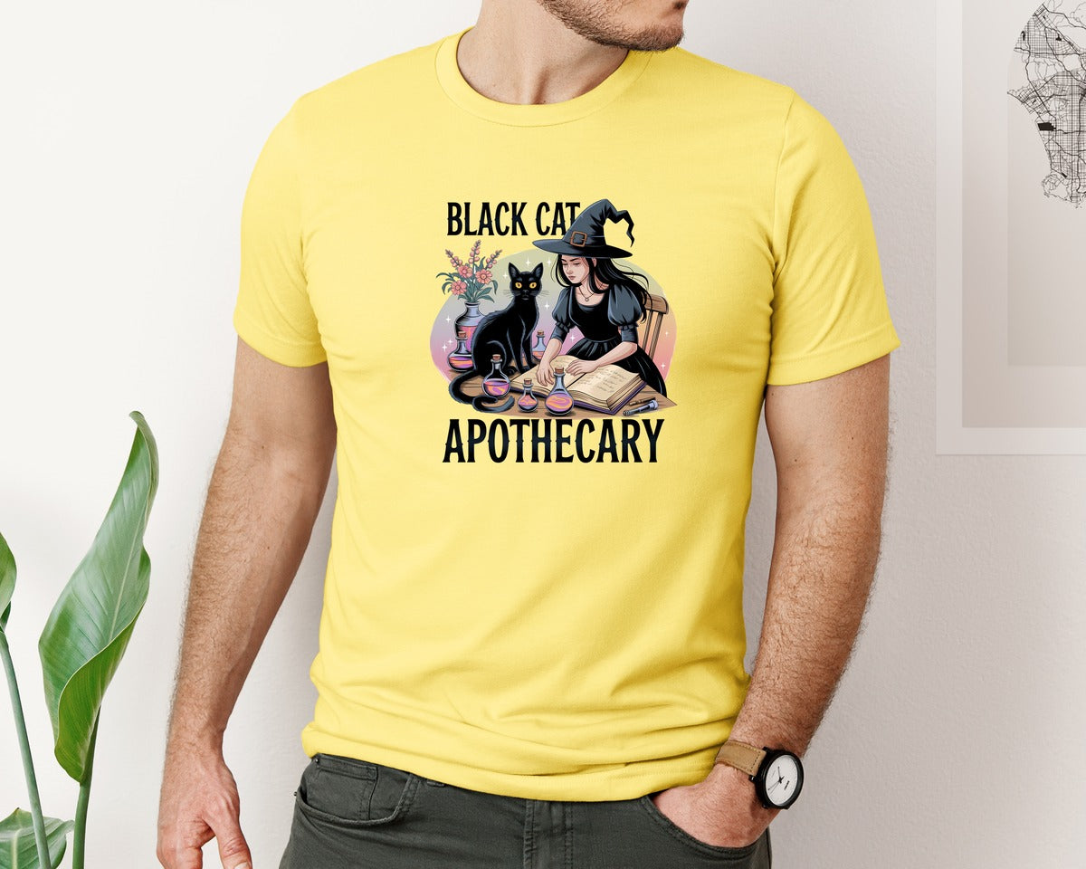 brand:Bella Canvas|color:Yellow|Black Cat Apothecary Witchy Book 7 Graphic T-Shirt