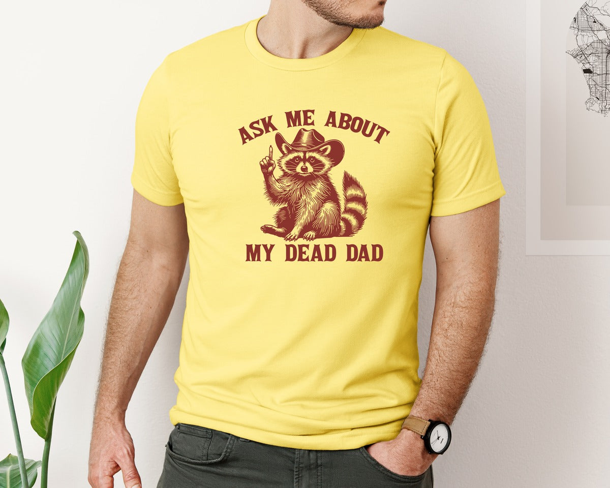 brand:Bella Canvas|color:Yellow|Dead Dad Club Unhinged Meme Raccoon Graphic T-Shirt