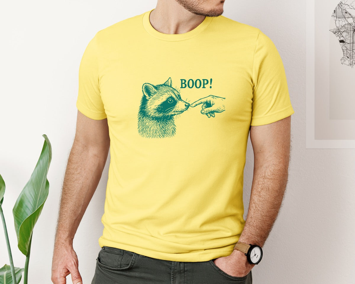 brand:Bella Canvas|color:Yellow|Boop Raccoon Finger Touching Nose Graphic T-Shirt