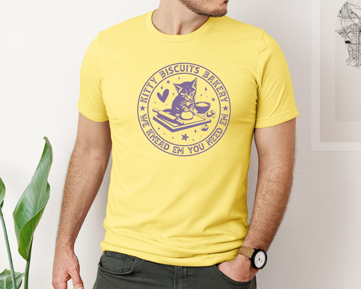 brand:Bella Canvas|color:Yellow|Kitty Biscuits We Knead Em You Need Em Graphic T-Shirt